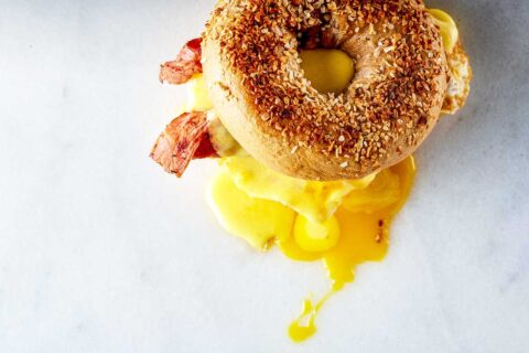 Juicy gooey breakfast bagel with runny egg, cheese and bacon at Great Bagel & Bakery in Lexington, KY