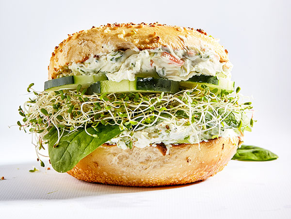 Healthy sprout and cream cheese bagel sandwich